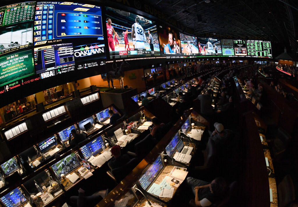 Photo of a viewing party for the NCAA Men's College Basketball Tournament inside the Race & Sports SuperBook at the Westgate Las Vegas Resort & Casino on March 15, 2018.