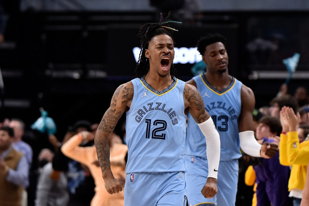 emphis Grizzlies guard Ja Morant #12 reacts during the game against the Los Angeles Lakers at FedExForum on December 29, 2021 in Memphis, Tennessee.